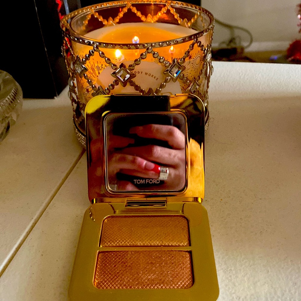 Tom ford sheer highlighting duo.   Reflects gilt